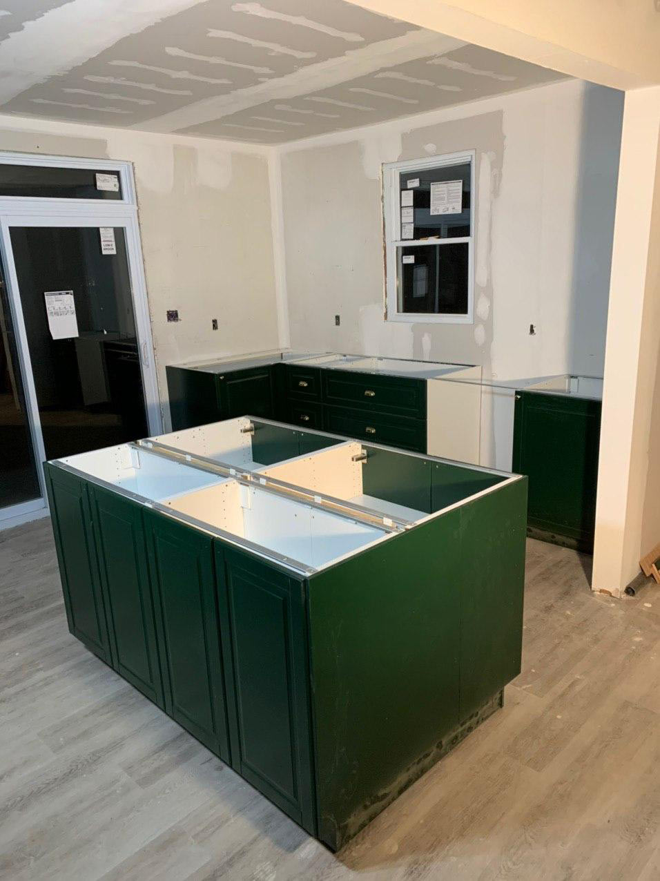 Two parallel wall IKEA kitchen 10ft long with 5ft island and BODBYN green IKEA doors style,